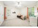 Bright bedroom with natural light, neutral carpet, and a cozy daybed at 10501 Olde Irongate Ln, Mint Hill, NC 28227
