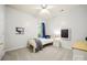 Bedroom featuring light grey walls, neutral carpet, and natural light at 10501 Olde Irongate Ln, Mint Hill, NC 28227