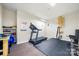 Bright exercise room featuring a treadmill, climbing wall, and padded flooring at 10501 Olde Irongate Ln, Mint Hill, NC 28227