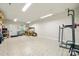 Spacious garage with ample room for parking and a workout area at 10501 Olde Irongate Ln, Mint Hill, NC 28227