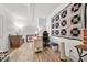 Office space featuring light hardwood floors, a work space, and a zebra patterned quilt at 10501 Olde Irongate Ln, Mint Hill, NC 28227