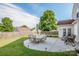 Outdoor living area with a concrete patio, outdoor seating, lush green lawn, and a privacy fence at 107 Golden Valley Dr, Mooresville, NC 28115