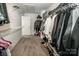 Large walk-in closet with shelving, ample storage space, and carpet flooring at 107 Golden Valley Dr, Mooresville, NC 28115