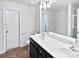 Well-lit bathroom with a double vanity, a large mirror, and a separate shower and tub at 108 Greenway View Ct, Mount Holly, NC 28120