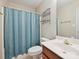 Functional bathroom features a shower with curtain, toilet, and single vanity at 12029 Forest Home Dr, Fort Mill, SC 29708