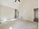 Neutral bedroom with vaulted ceilings, plush carpeting, and a ceiling fan at 12029 Forest Home Dr, Fort Mill, SC 29708