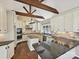 Modern kitchen with granite countertops, stainless steel appliances and vaulted ceiling at 12029 Forest Home Dr, Fort Mill, SC 29708