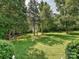 Expansive lawn featuring shade trees and a view of the home's exterior at 12029 Forest Home Dr, Fort Mill, SC 29708