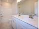 Bright bathroom features double vanity with white cabinets and marble floor at 123 Armstrong Rd, Belmont, NC 28012