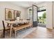 Inviting dining room with a dining table, bench, and access to the backyard at 123 Armstrong Rd, Belmont, NC 28012