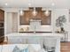 Modern kitchen featuring stainless steel appliances, quartz countertops, and pendant lighting at 123 Armstrong Rd, Belmont, NC 28012