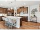 Modern kitchen with stainless steel appliances, a kitchen island, and stylish pendant lighting at 123 Armstrong Rd, Belmont, NC 28012
