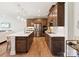 Sleek kitchen with stainless steel appliances, an island with seating, and elegant cabinetry at 123 Armstrong Rd, Belmont, NC 28012