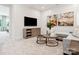 Cozy living room with white shiplap walls, modern furniture, and an entertainment center at 123 Armstrong Rd, Belmont, NC 28012