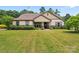 Charming single-Gathering home with a well-manicured lawn and lush landscaping, offering great curb appeal at 137 Leaning Tower Dr, Mooresville, NC 28117