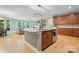 A bright and modern kitchen with a large island, stainless steel appliances, and an open layout at 137 Leaning Tower Dr, Mooresville, NC 28117