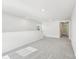 Spacious carpeted loft with natural light, neutral walls, and an adjacent doorway at 141 Satchel Ct, Mooresville, NC 28115