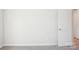 The carpeted bedroom offers a door for access to other rooms at 1413 Old Rivers Rd, Concord, NC 28027