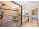 Bathroom featuring a tiled shower, separate soaking tub, and neutral color palette at 145 Waterwood Dr, Shelby, NC 28150