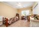 Cozy bedroom with a twin bed, desk area, natural light, and charming decor at 145 Waterwood Dr, Shelby, NC 28150