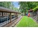 Lakefront home with a covered boat dock, boat slip, and waterfront access at 145 Waterwood Dr, Shelby, NC 28150