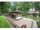 Waterfront home with a dock featuring a boat slip and lakeside lounging area at 145 Waterwood Dr, Shelby, NC 28150
