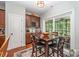 Cozy breakfast nook features a small table and chairs near a sliding glass door at 145 Waterwood Dr, Shelby, NC 28150