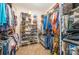 Well-organized walk-in closet with shelving and hanging space for clothes and accessories at 145 Waterwood Dr, Shelby, NC 28150
