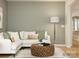 Comfortable living room featuring a plush sofa, stylish decor, and ample natural light at 1569 Croydon St, Indian Land, SC 29707