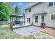 Backyard with patio, gazebo, grill, and outdoor seating, perfect for entertaining at 1633 Kiawah Ct, Gastonia, NC 28056
