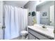 Bathroom with shower and tub combination, plus a single sink and vanity at 1633 Kiawah Ct, Gastonia, NC 28056