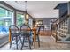 Breakfast nook offers abundant natural light, tile floors, and flows into the living room at 1633 Kiawah Ct, Gastonia, NC 28056