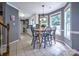 Bright eat-in kitchen area with large windows and tile flooring at 1633 Kiawah Ct, Gastonia, NC 28056