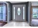 Welcoming foyer with tile flooring, sidelights, and decorative glass front door at 1633 Kiawah Ct, Gastonia, NC 28056