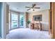 Bright home office featuring large windows, neutral carpet, and elegant crown molding at 1633 Kiawah Ct, Gastonia, NC 28056