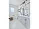 Bright bathroom with double vanity, modern fixtures, and a window for natural light at 1673 Beleek Ridge Ln, Clover, SC 29710