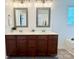 Bathroom with dual sinks, vanity, framed mirrors, and soaking tub in a well lit space at 1673 Beleek Ridge Ln, Clover, SC 29710