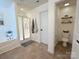 Bathroom featuring a walk-in shower, soaking tub, a separate toilet room and neutral-colored tiles at 1673 Beleek Ridge Ln, Clover, SC 29710