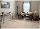Cozy bedroom features comfortable seating, neutral colors, and a large window at 1673 Beleek Ridge Ln, Clover, SC 29710