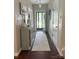 Inviting foyer with hardwood floors, a decorative console table, and a view of the front door at 1673 Beleek Ridge Ln, Clover, SC 29710