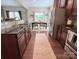 Modern kitchen featuring stainless steel appliances and dark wood cabinetry at 1673 Beleek Ridge Ln, Clover, SC 29710