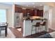 Modern kitchen features stainless steel appliances and a breakfast bar with seating at 1673 Beleek Ridge Ln, Clover, SC 29710
