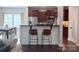 Modern kitchen features stainless steel appliances and a breakfast bar with seating at 1673 Beleek Ridge Ln, Clover, SC 29710