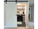 Convenient laundry area with modern appliances, ample storage, and stylish finishes for efficient home tasks at 1673 Beleek Ridge Ln, Clover, SC 29710