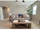 Comfortable living room features a stylish sofa and a rustic coffee table, creating a welcoming atmosphere at 1673 Beleek Ridge Ln, Clover, SC 29710