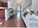 Inviting living room with hardwood floors and a staircase, perfect for entertaining at 1673 Beleek Ridge Ln, Clover, SC 29710