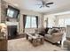 Spacious living room features a stone fireplace and ample seating at 1673 Beleek Ridge Ln, Clover, SC 29710