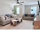 Spacious living room with neutral decor and comfortable seating creates an inviting space for relaxation and entertainment at 1673 Beleek Ridge Ln, Clover, SC 29710