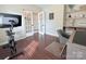 The office space has french doors and a stationary bike at 1673 Beleek Ridge Ln, Clover, SC 29710
