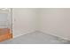 The bedroom features neutral paint and carpet at 1713 Andover Nw St, Concord, NC 28027